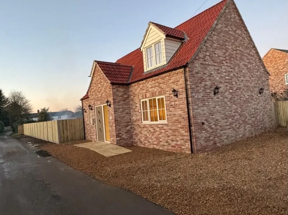 Completed dormer house at dusk