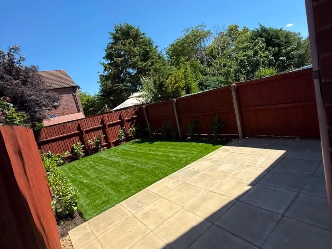 Finished garden with patio, lawn and fencing