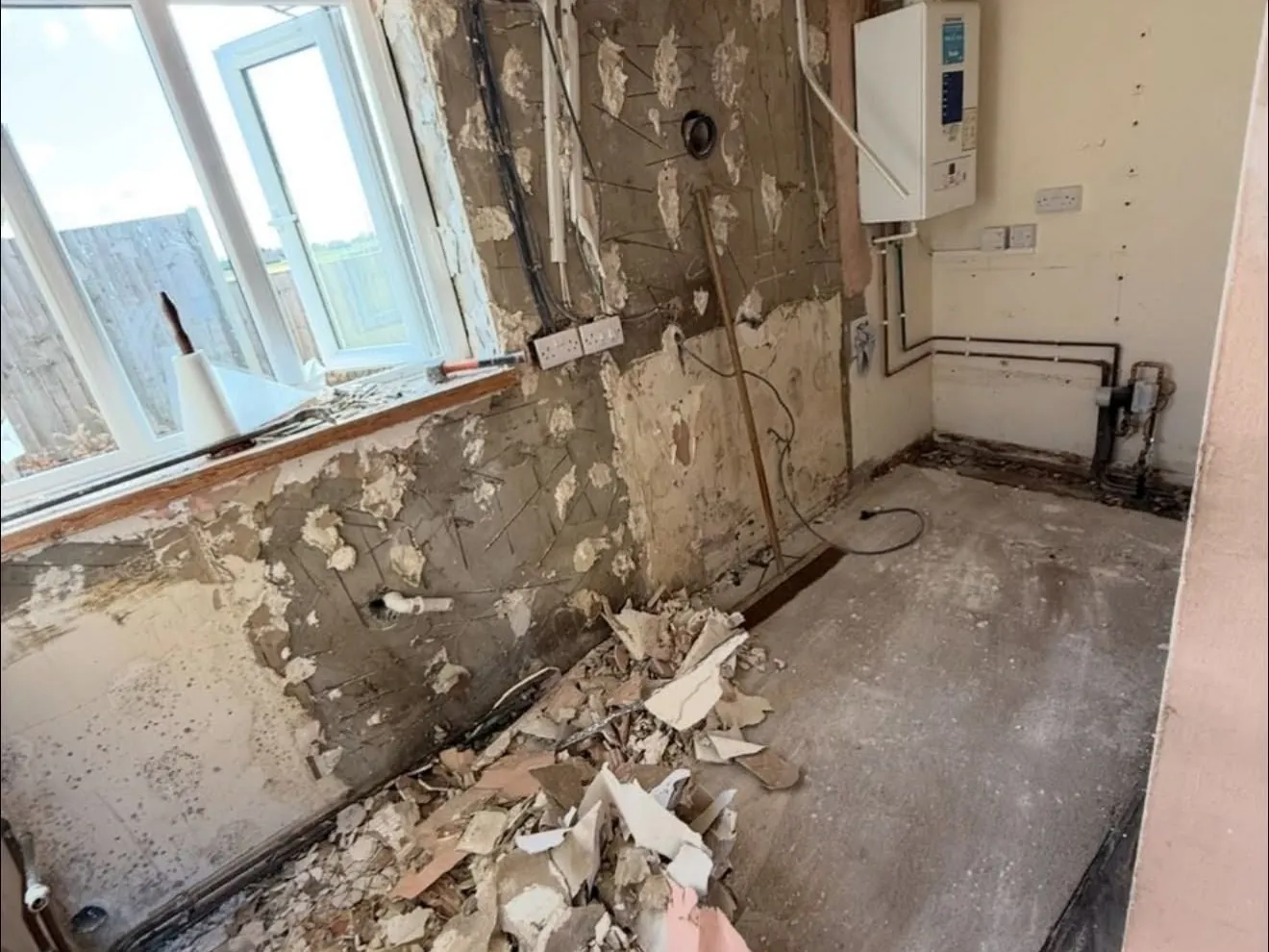 Kitchen during strip-out before renovation